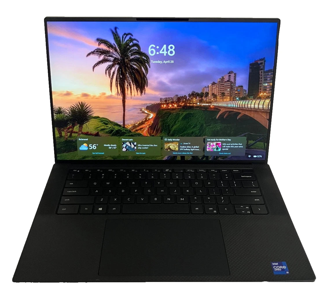 Black laptop with a scenic display on a white background